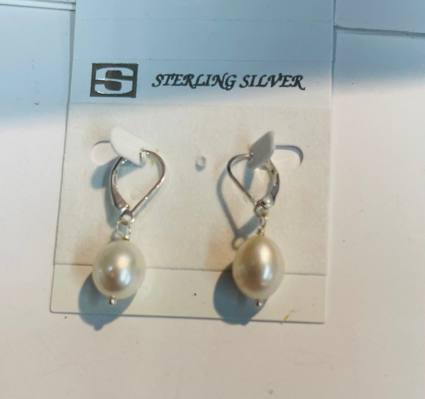 Natural Pearl on Sterling silver lever back earring